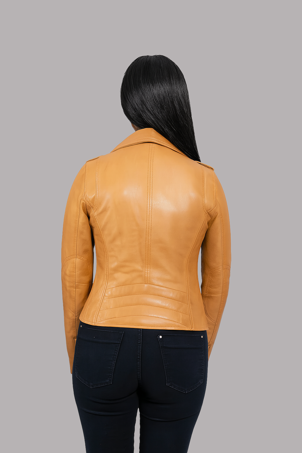 Back view woman gold leather biker jacket